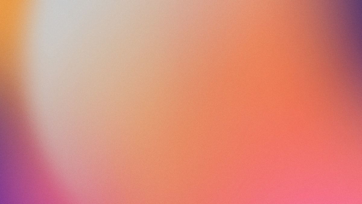 撤退ラインを決めて続けることを表す、暖色の柔らかな抽象的なグラデーション