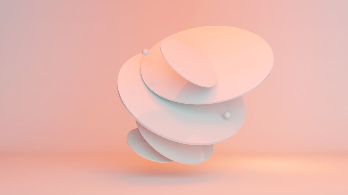 ツールより効く中身を表す、ピーチ色の円盤が重なる抽象的な3D
