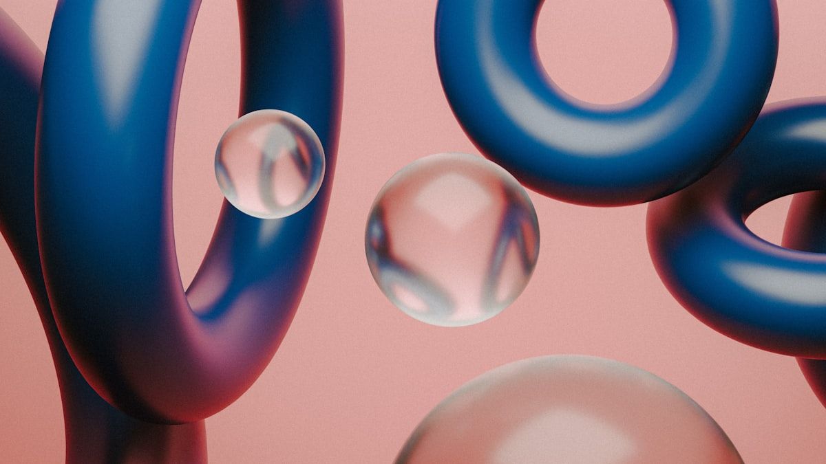 集客できないサイトの構造を表す、ピンク背景に青いリングと透明な球体の抽象的な3D