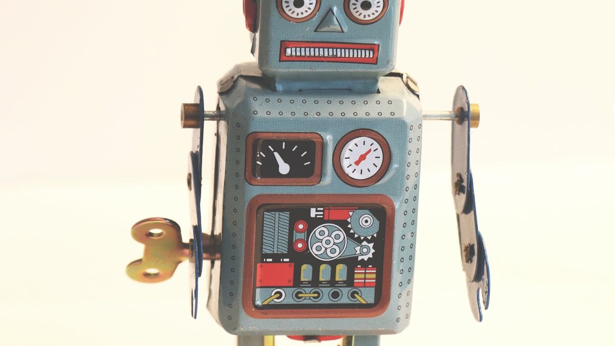 AIの機械的な生成の仕組みを表すレトロなロボット
